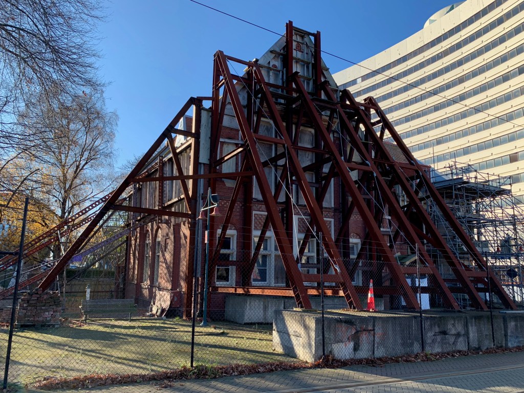 Building in Christchurch being held up by bracing after earthquake damage.